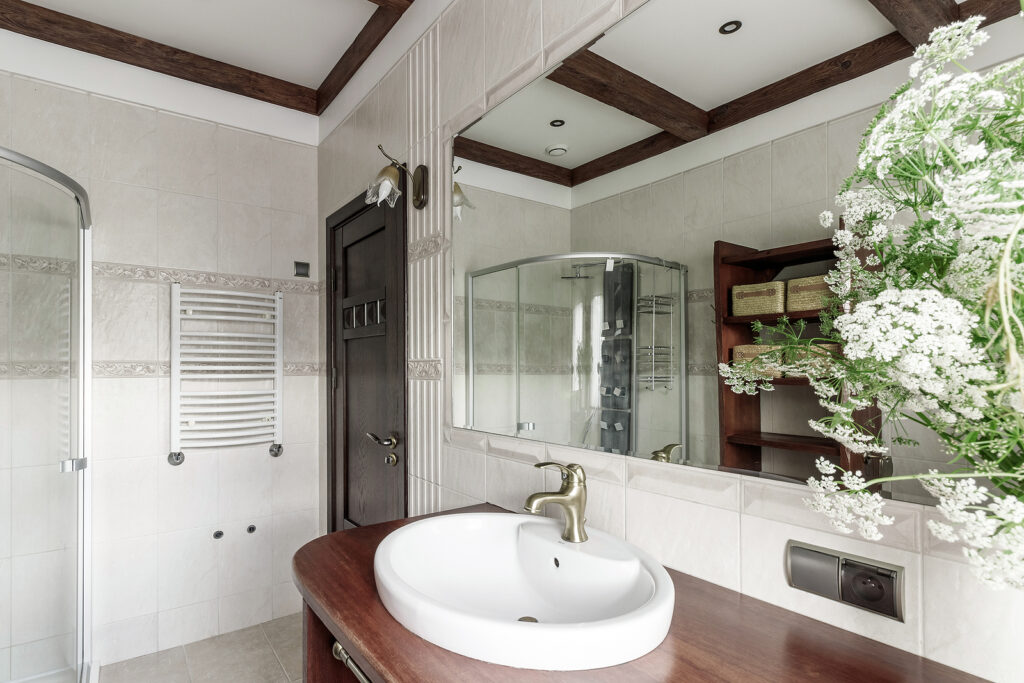 Modern Bathroom Interior With Stylish Mirror And Vessel Sink.