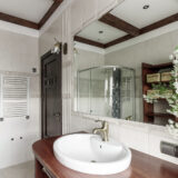 Modern Bathroom Interior With Stylish Mirror And Vessel Sink.