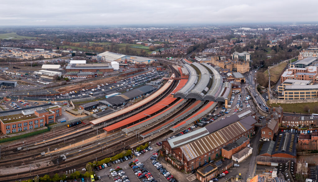 YORK, UK - JANUARY 28, 2023. An aerial view of the buildings and surrounding area of York train station in North Yorkshire