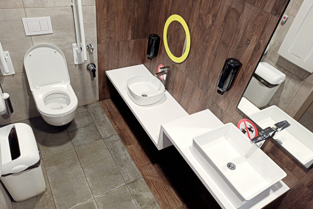 Toilet With Armrest For The Disabled. Toilet At The Gas Station.